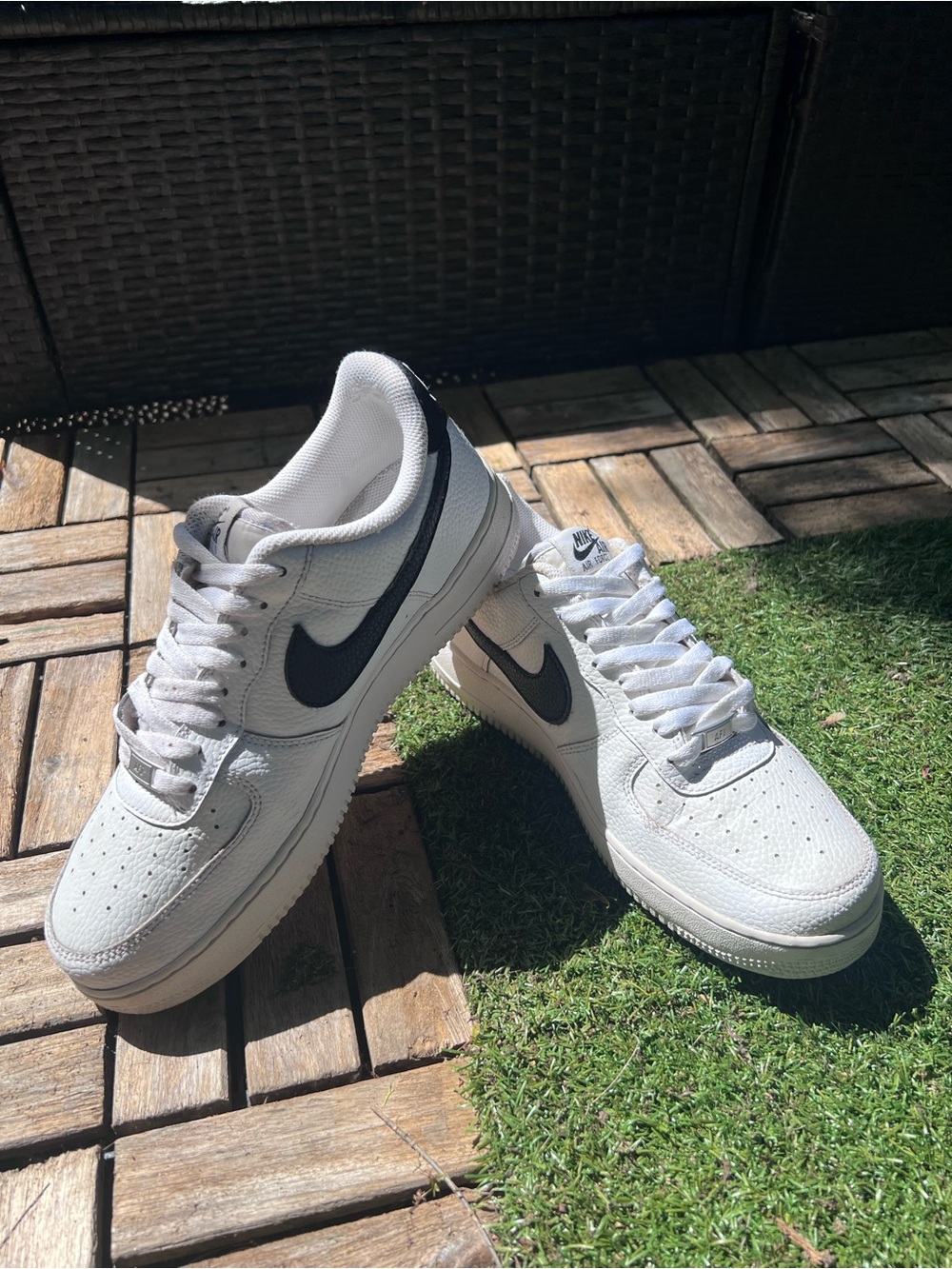 Nike White Sneakers with Black Swoosh Accent